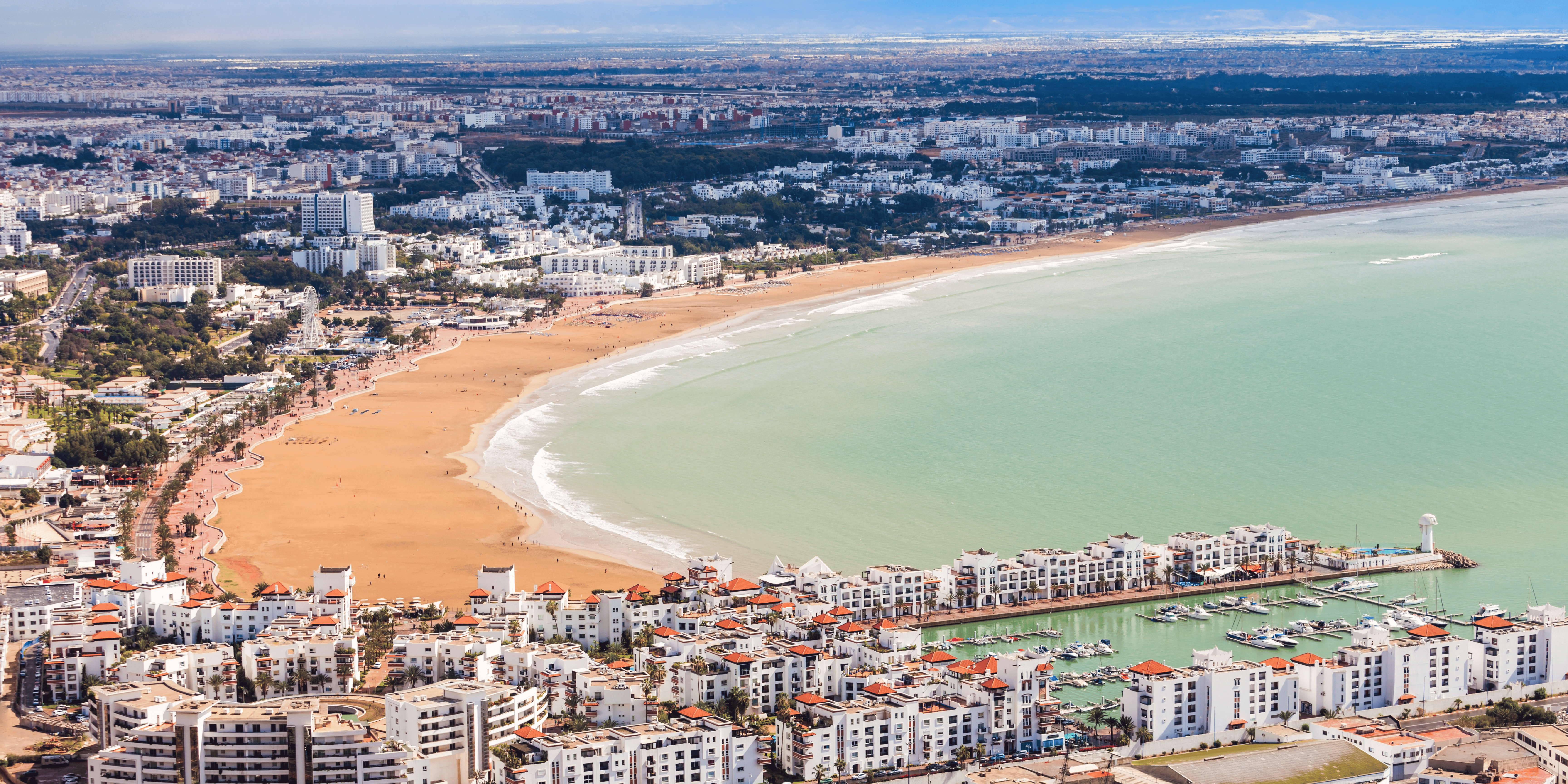 Beautiful seaside view of Agadir, showcasing its sandy beaches, modern resorts, and the scenic Agadir Marina.